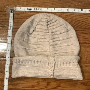 Cream beanie with woven detail